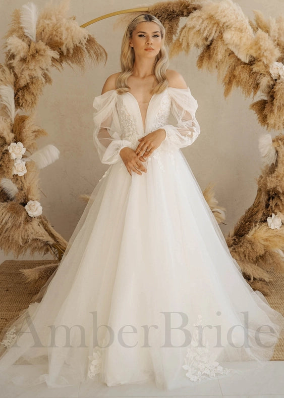 Boho A Line Floral Wedding Dress with Long Puffy Sleeves from Urbanheer Boho A Line Floral Wedding Dress with Long Puffy Sleeves from Urbanheer