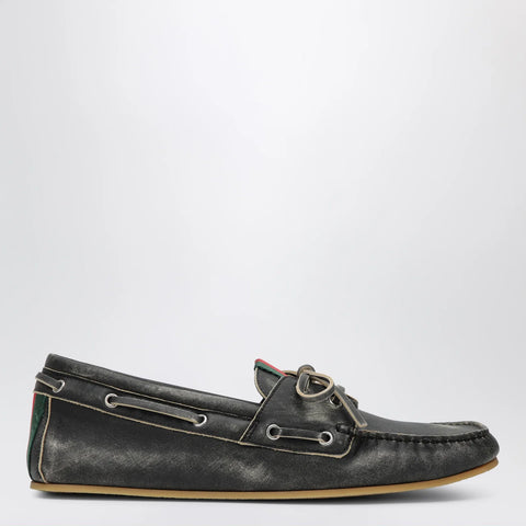 GUCCI Black boat shoes with washed effect