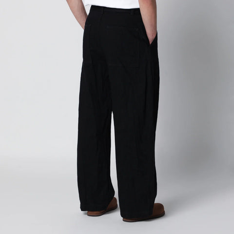 STUDIO NICHOLSON Now mid-rise jeans in black cotton denim