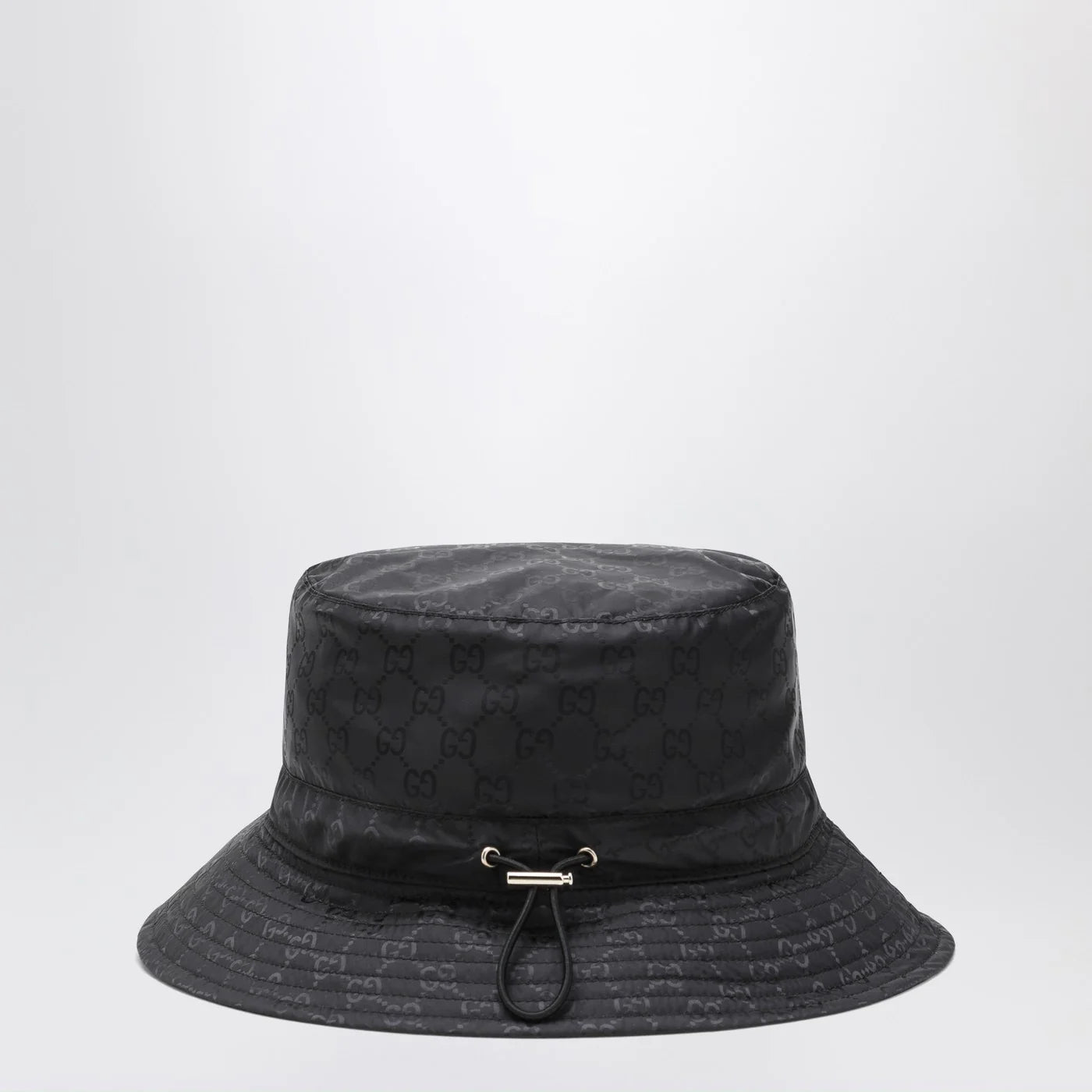 GUCCI Reversible black nylon GG hat