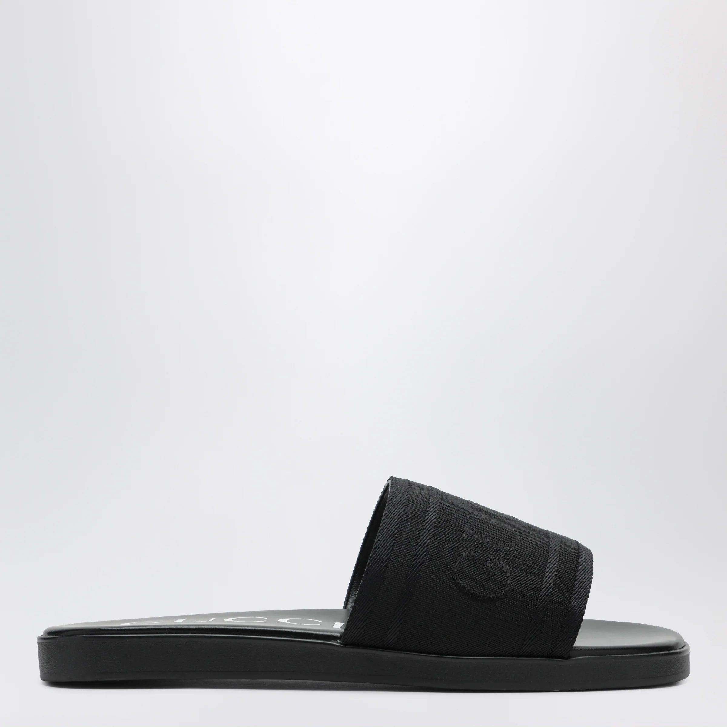 GUCCI Black jacquard fabric slides