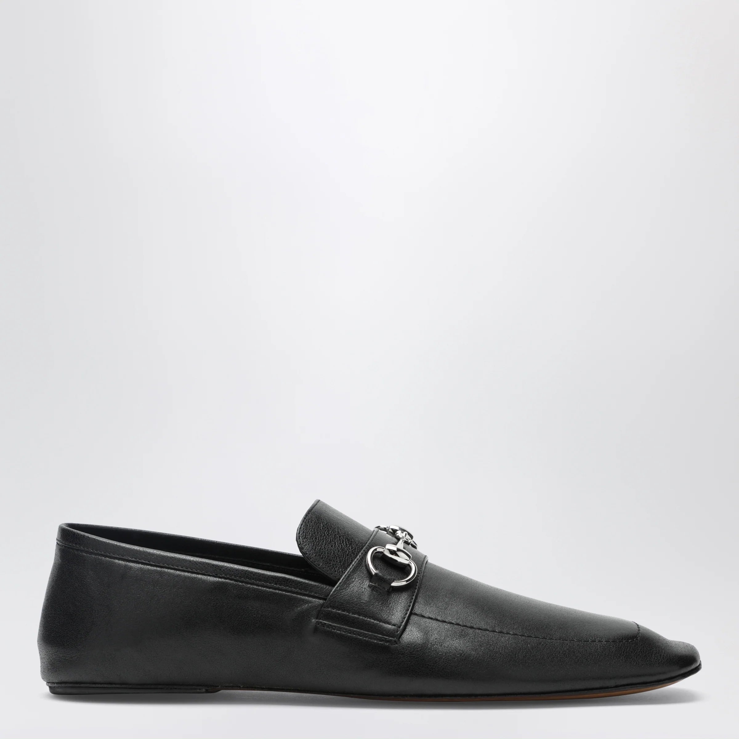 GUCCI Black leather horsebit loafers with silver hardware