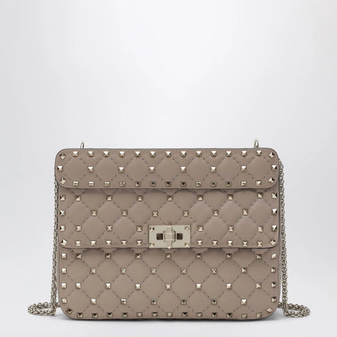 Valentino Garavani Medium Rockstud Spike bag in powder pink nappa leather