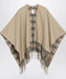 Burberry Reversible wool check cape with fringes in sand beige