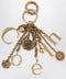 Chloé Bag charm keyring Symbols Logo in vintage gold brass