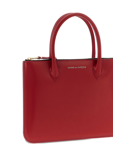 COMME DES GARCONS WALLET Bags.. RED