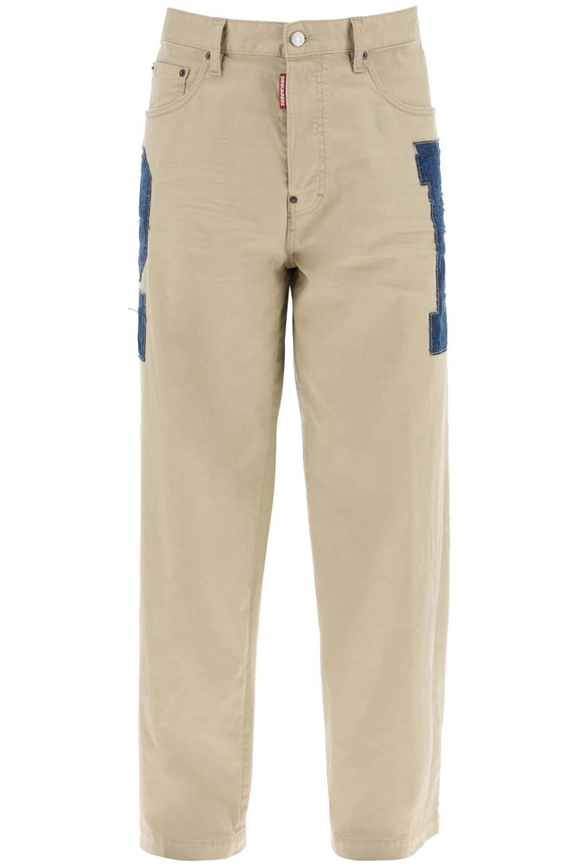 Dsquared2 eros denim pants with maxi patch design.-men > clothing > trousers-Dsquared2-Urbanheer