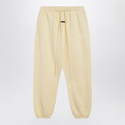 Fear of God Essentials Yellow jogging pants with logo