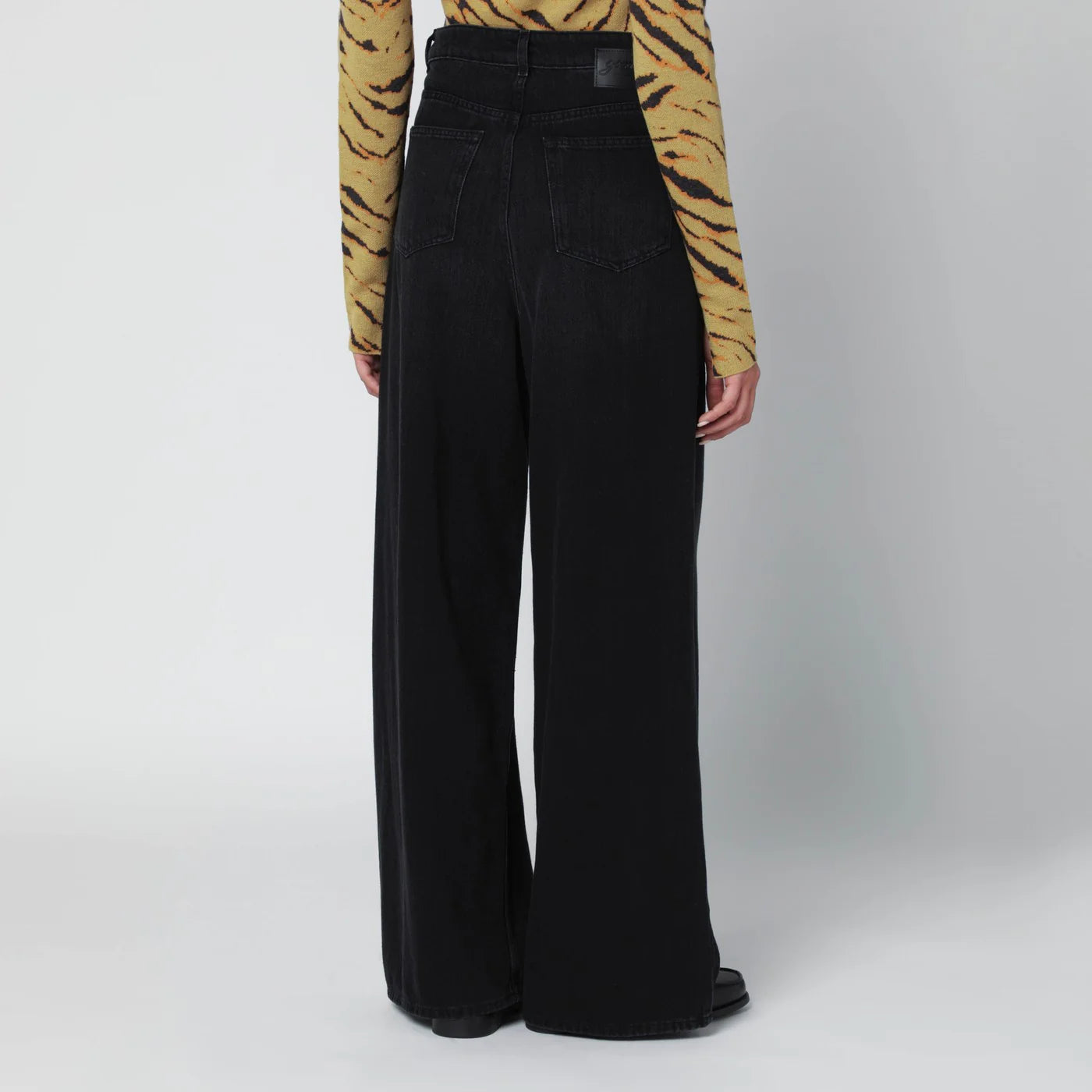 GANNI Black washed-effect baggy jeans
