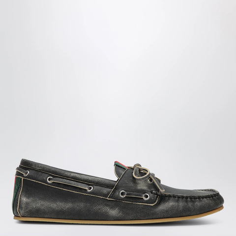 GUCCI Black boat shoes with washed effect