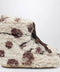 Moon Boot Icon Low curly boot with cow print