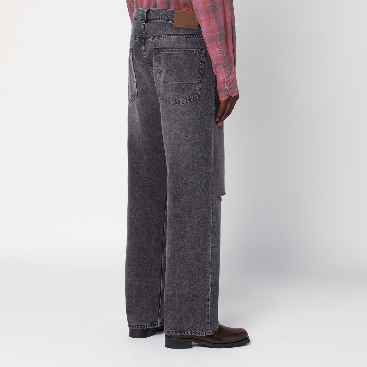 Our Legacy Faded effect jeans with rips
