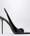 Paris Texas Black patent slingback sandals