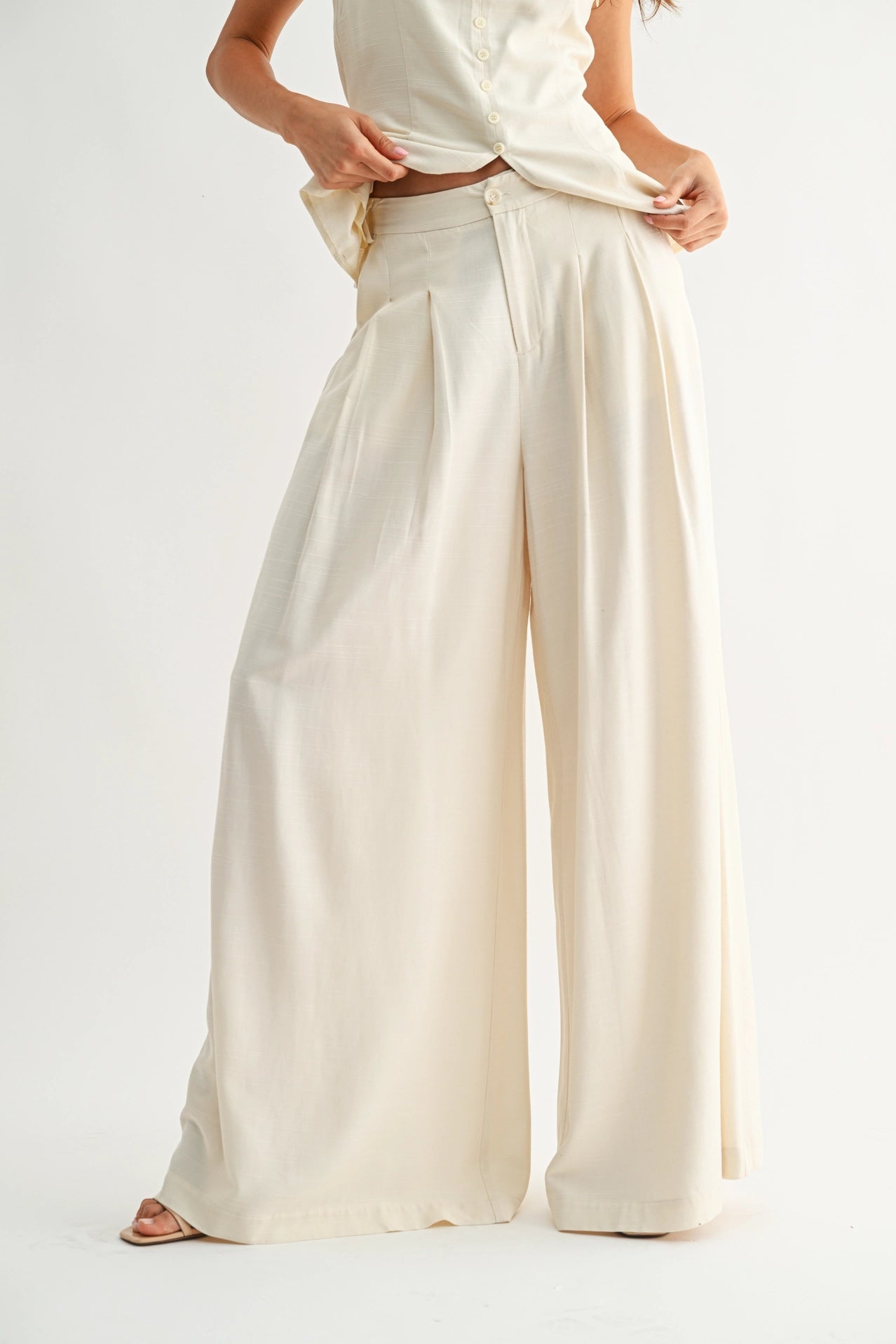 Wide-Leg Pleated Trousers