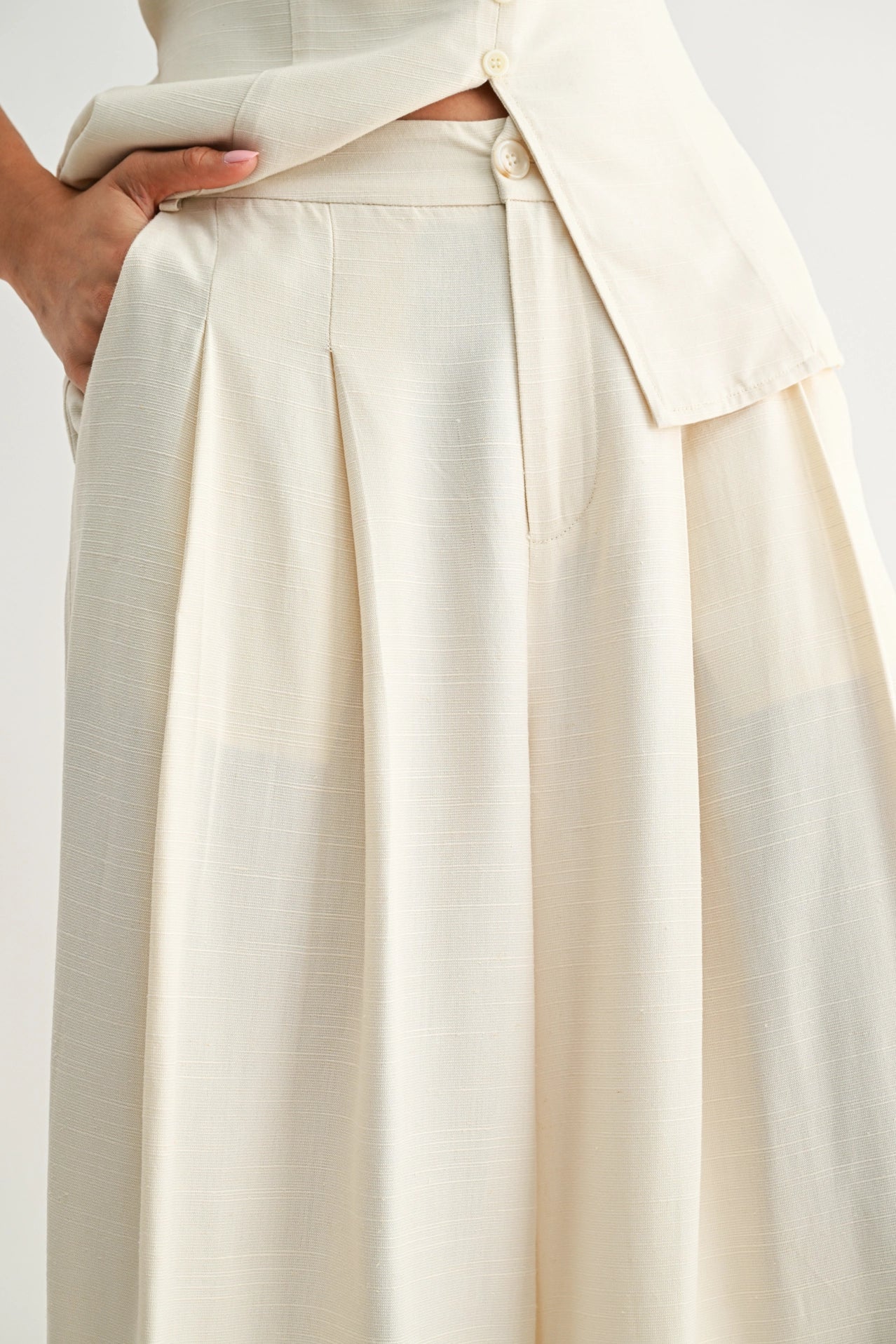 Wide-Leg Pleated Trousers