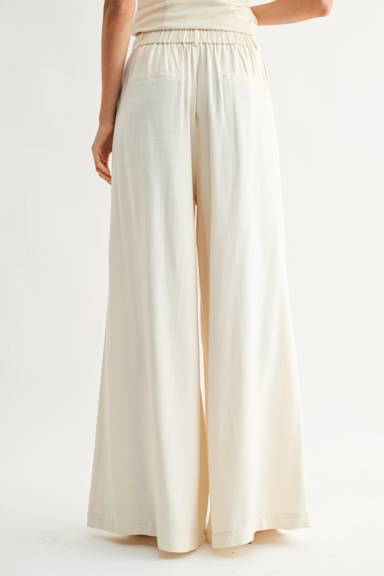 Wide-Leg Pleated Trousers