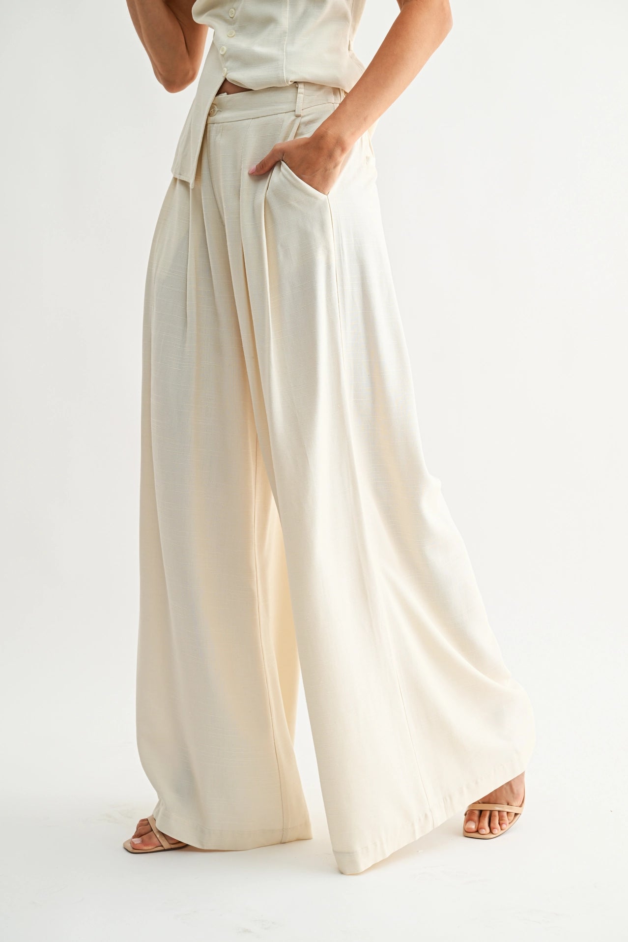 Wide-Leg Pleated Trousers