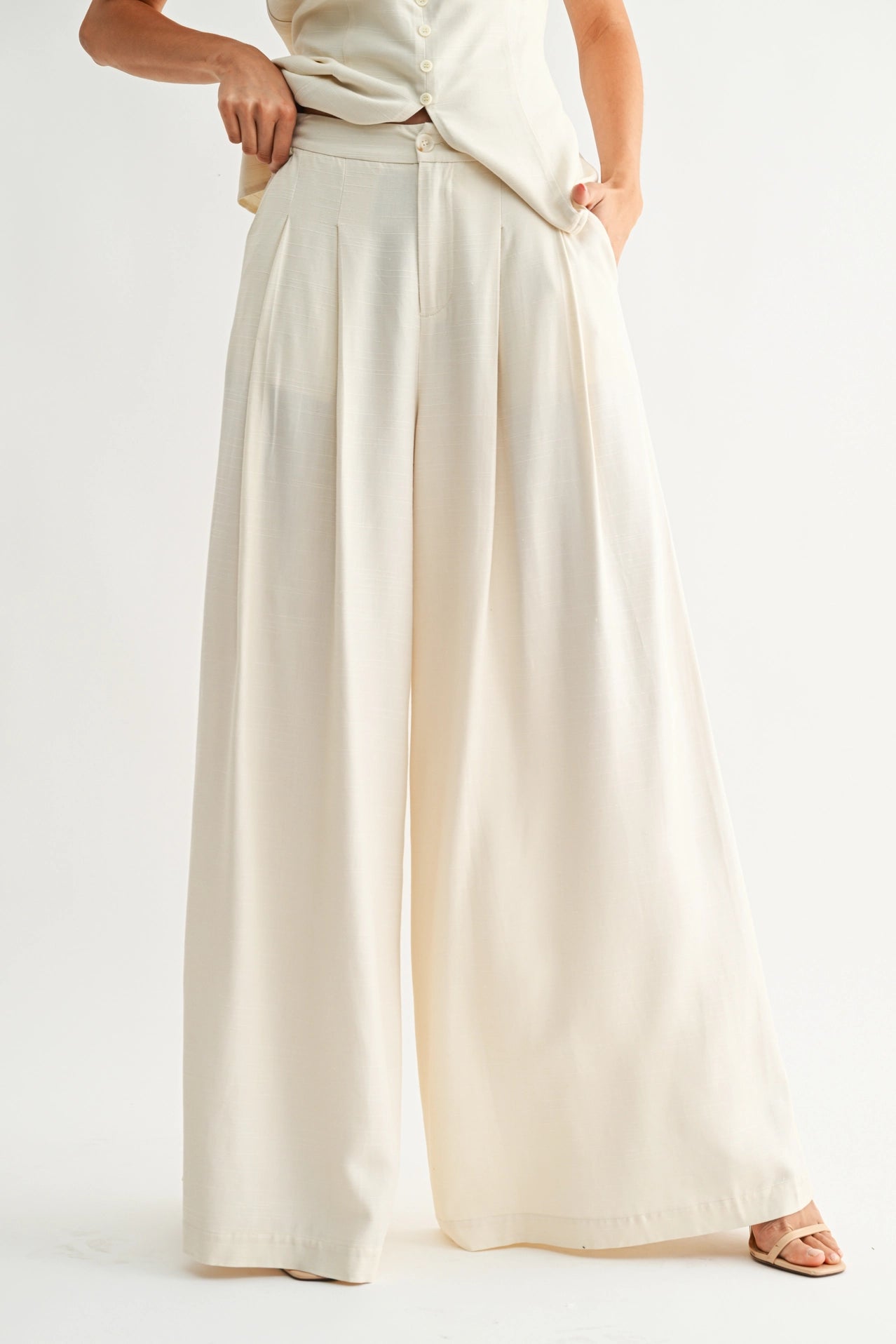 Wide-Leg Pleated Trousers