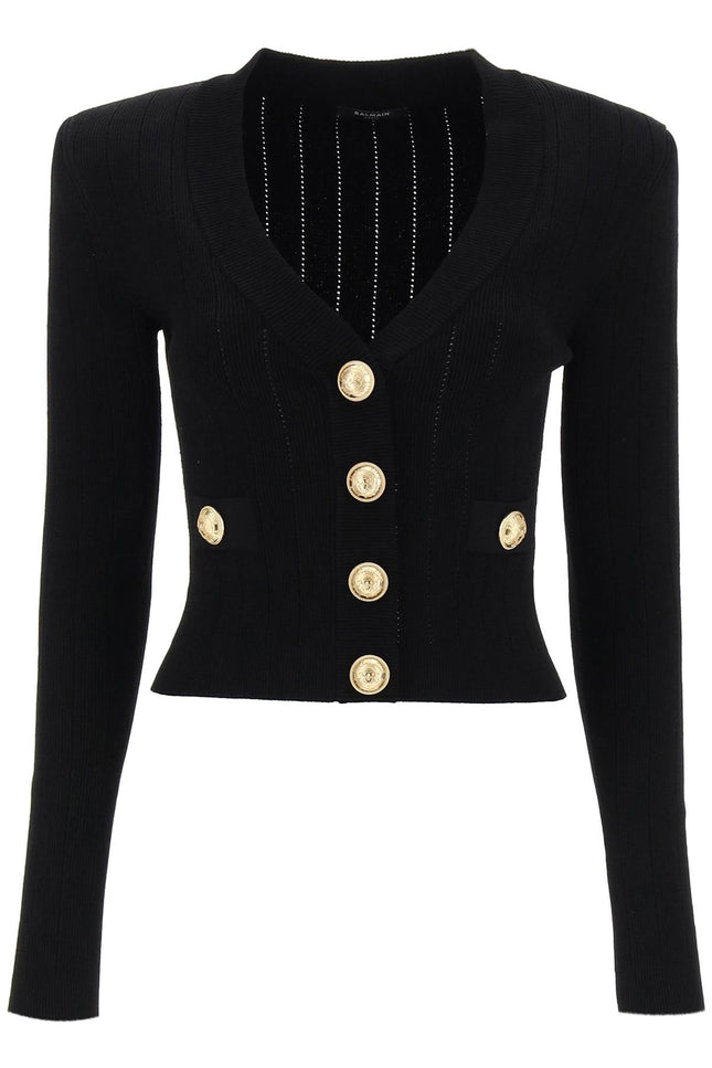 cardigan with padded shoulders and embossed buttons