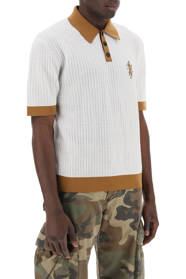polo shirt with contrasting edges and embroidered logo