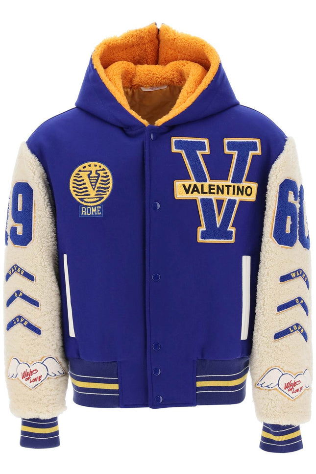 varsity bomber jacket with shearling sleeves