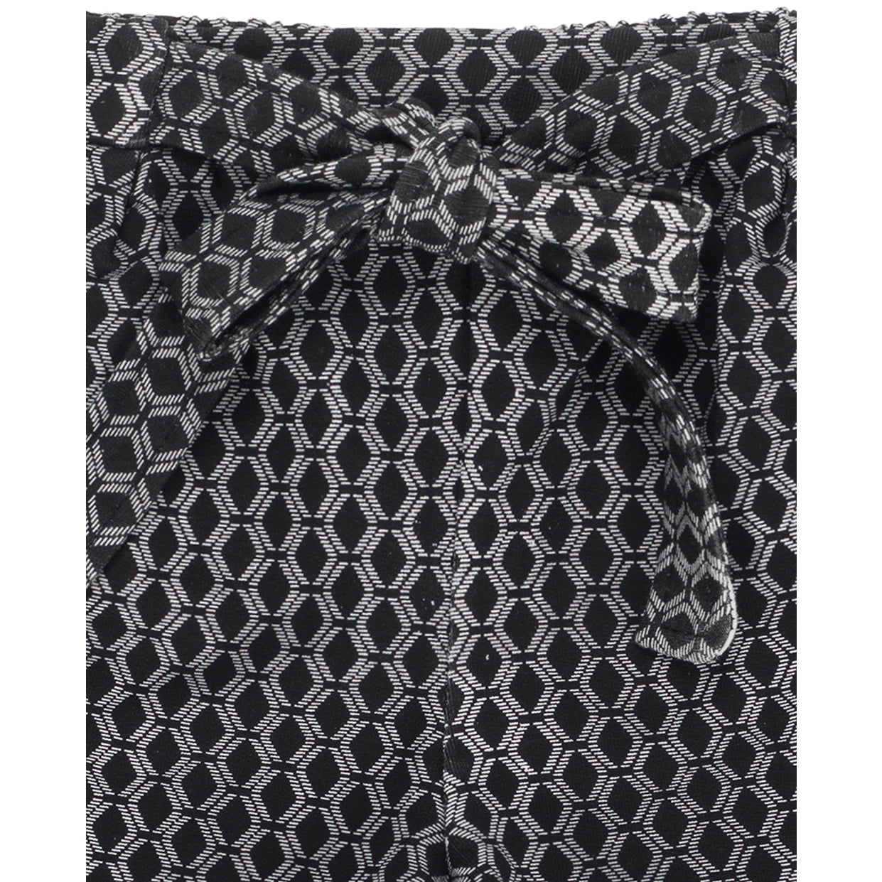 Girl's shorts in black and ecru printed elastic fleece.